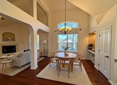 From the front entry, the formal dining room and living room are open for enjoyment.