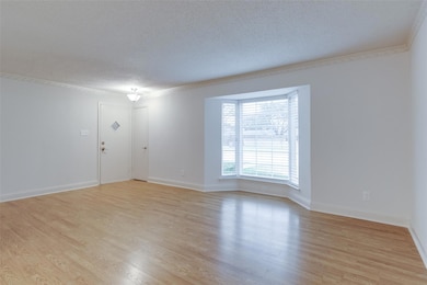 Empty room featuring light wood finished floors, a