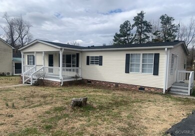 View of front of property featuring crawl space, a
