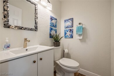Half bath at front entrance.