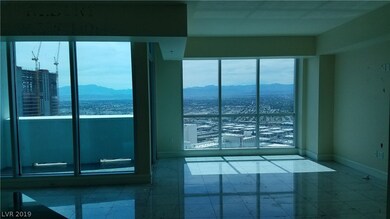View of condo from entrance. Living room to right
