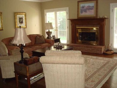 Warm and inviting family room with wet bar.