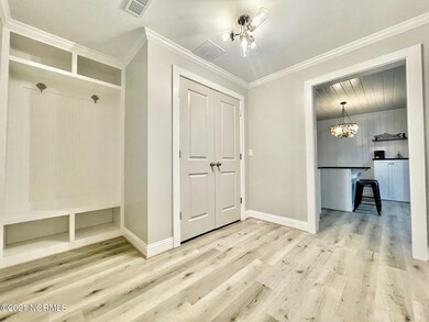 FOYER LOOKING INTO KITCHEN