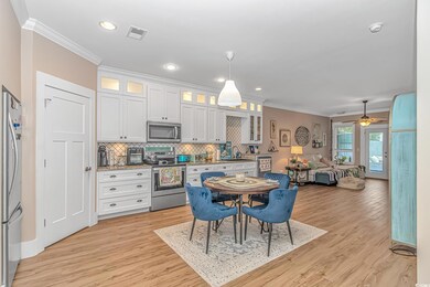 Dining space with light wood-style floors, ornamen