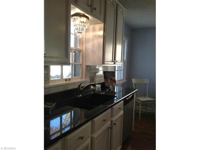 Another view of the kitchen which also includes a 