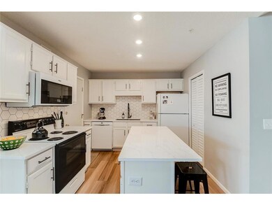 White and clean kitchen! This kitchen features qua
