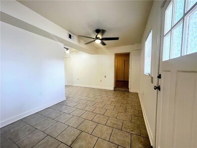 Tile throughout the unit. This is the living room