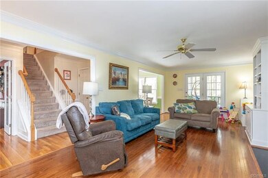 Living Room with French doors leads to Kitchen and