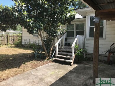 Rear Deck.  Kitchen Entry.