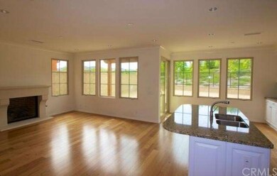 Kitchen area with breakfast bar and nook looking o