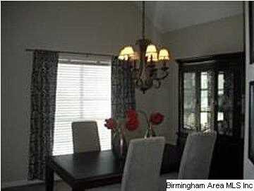 DINNING ROOM OPENS TO FAMILY ROOM