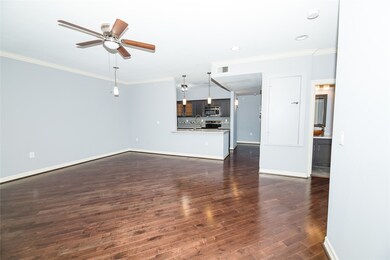 Wood floors warm up the space.