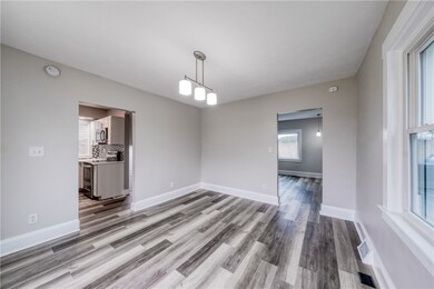 The dining room (14x12) has a sliding glass door w