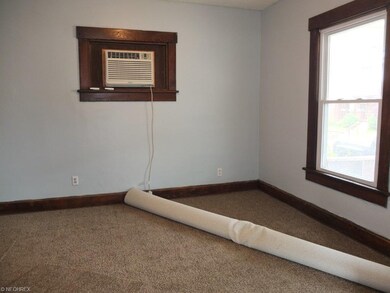 Formal dining room with new carpet.