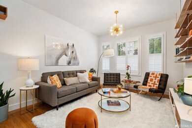 Stylish, South facing, sunny living room with ampl