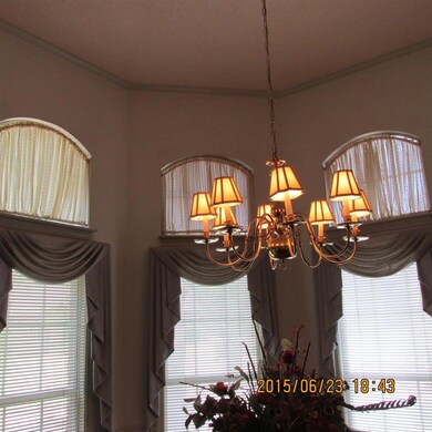 Lovely windows in the formal dining room adding to