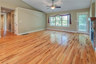 Living area opens onto a lovely second-story deck