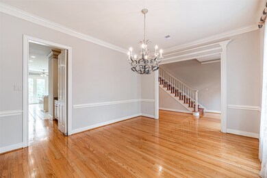 The dining room has access to the kitchen and a cu