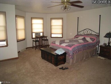 Huge master suite with walk-in closet and private full bath.