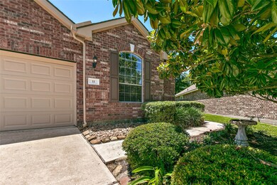 Lovely landscaped walkway welcomes you home.