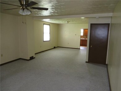 Another view of living room and dining room