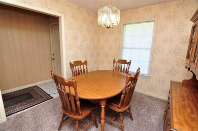 Step inside the entry hall with tile floor and ope