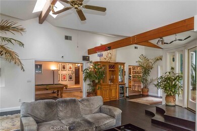 Living room and dining room adjacent to family room with half bath nearby