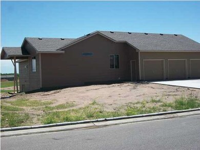 Side view showing covered area for wood deck to be
