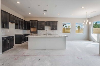 MODEL PICTURE**Kitchen with an inviting chandelier