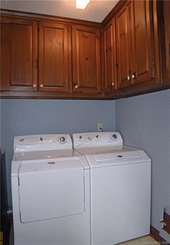 Laundry with ample storage conveniently located of
