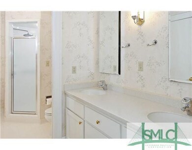 Exterior Front. Master Bath has two sinks, tiled f