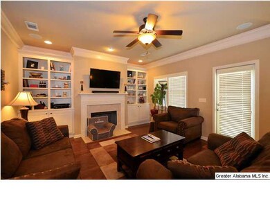 Large Living Room with fireplace, built in bookshe