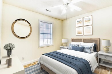 Bedroom with baseboards and a ceiling fan