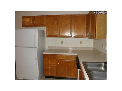 Another angle of the kitchen to show the refrigera