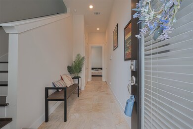 Front entry leads into a bright, inviting interior