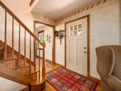 Front Door to Stairs & Dining Room
