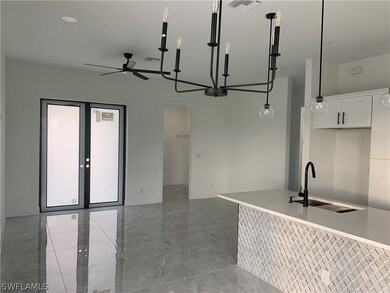 Front door, entrance to laundry, living room + par