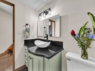 Powder room off the entry foyer.