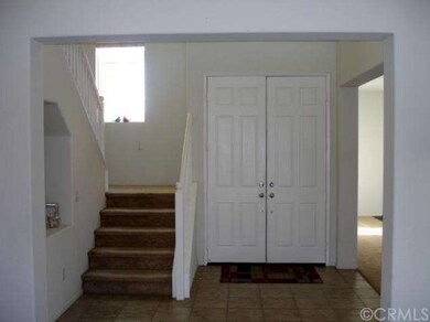 Entryway, staircase, formal dining/living room, wi