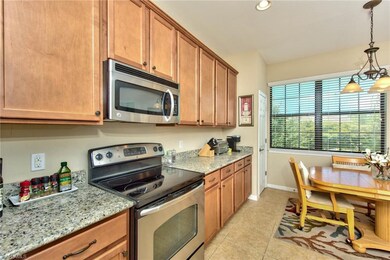 Wood Cabinets, Granite Counters & Stainless Steel 