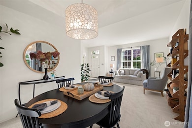 Spacious Living and dining rooms with new carpet and plenty of light