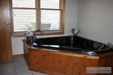 Bathroom: Whirlpool tub.