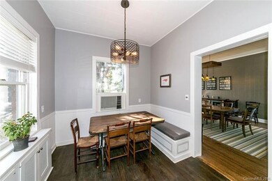 Eat-in area open to kitchen off dining room