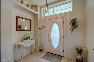 Entryway featuring light tile patterned flooring