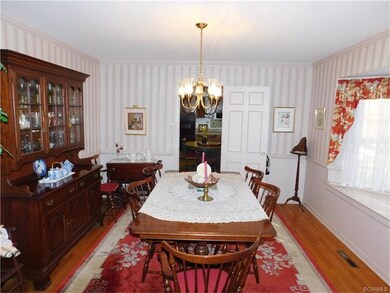 Formal Dining Room with Hardwood Floor