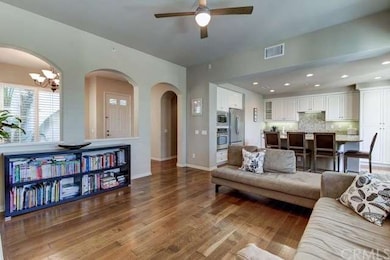 Open design with family room, kitchen and dining a