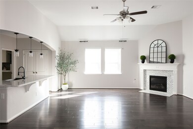 Large window and gas fireplace gives this large ro