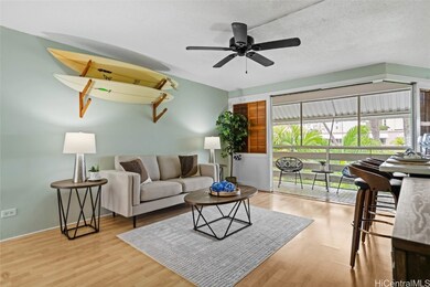 Living room and large covered lanai. Laminate floo
