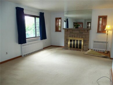 Living room with log burning fireplace