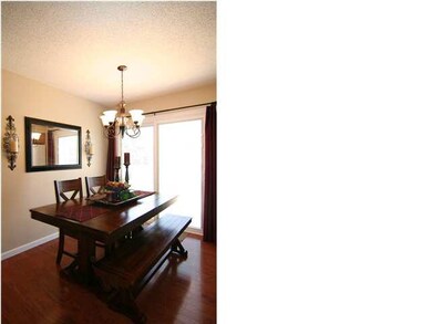 Dining Room. New Pella sliding glass door has blin
